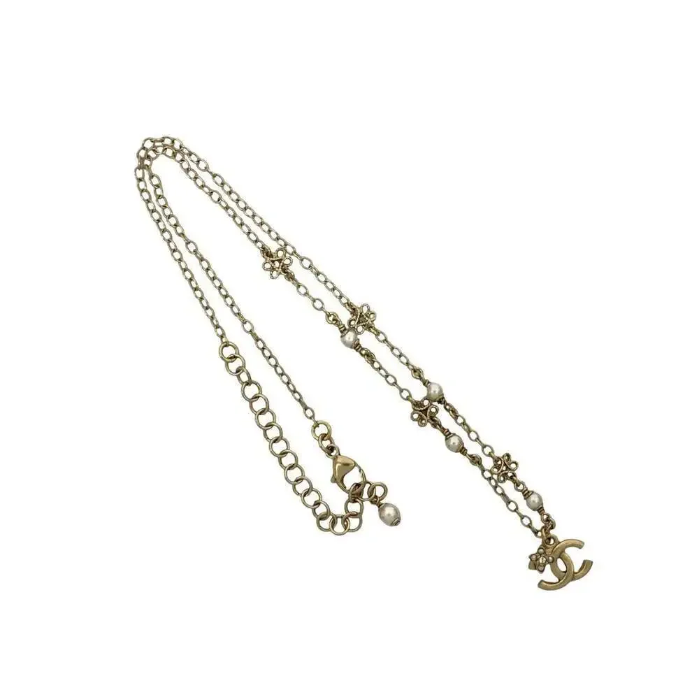 CHANEL Gold Pearl Logo Necklace